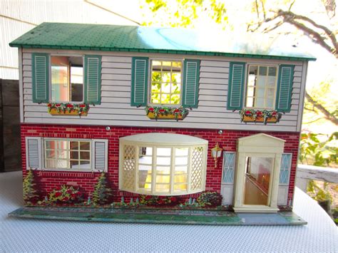 vintage metal foll house|tin doll houses from 1960s.